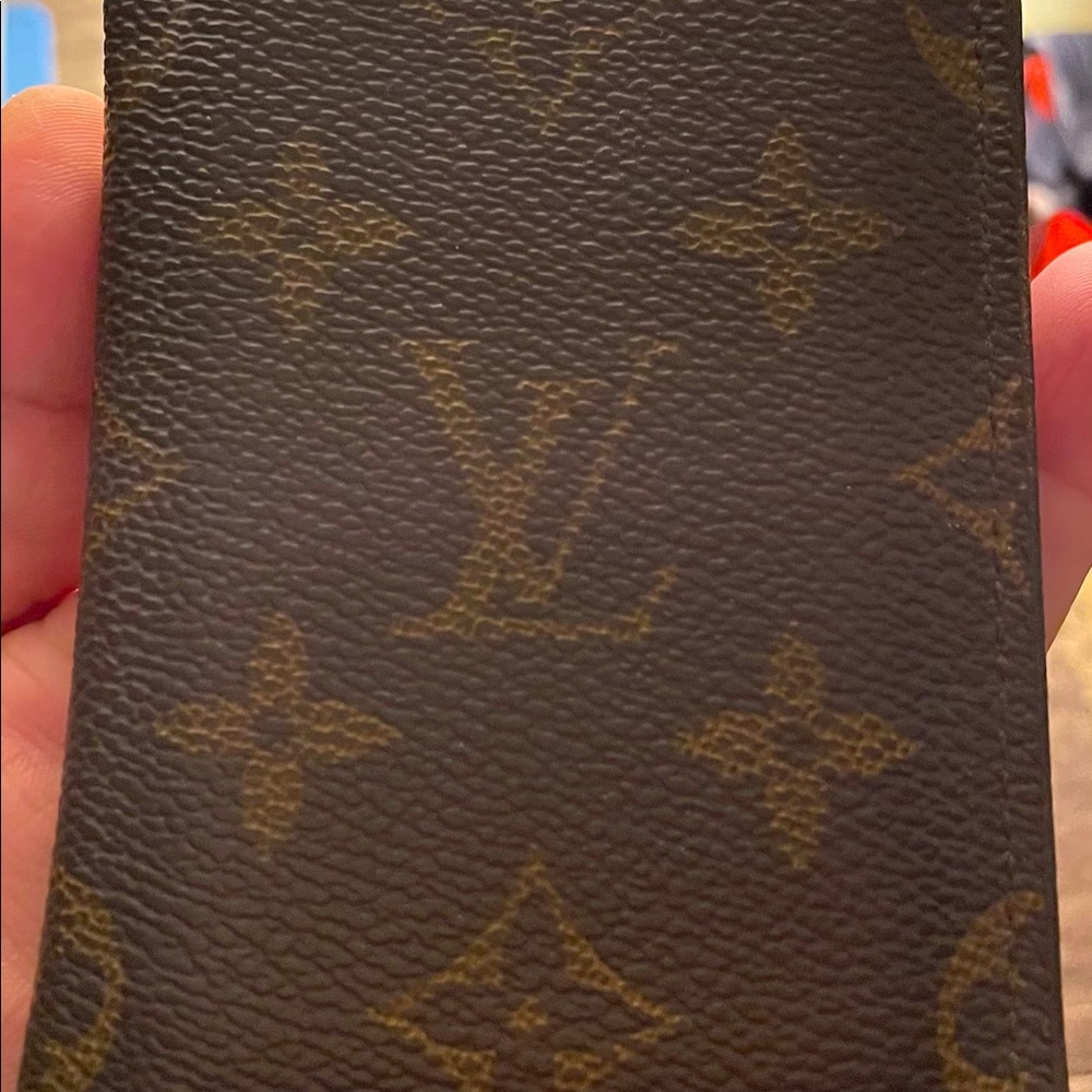 This wallet was use once so is new basically. Nice pocket size!